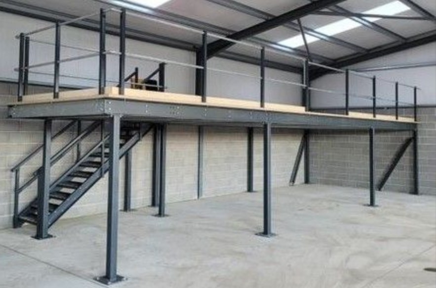 Mezzanine Levels solve storage problems. – mezzanine floor in sheds, photo of small mezzanine in warehouse.