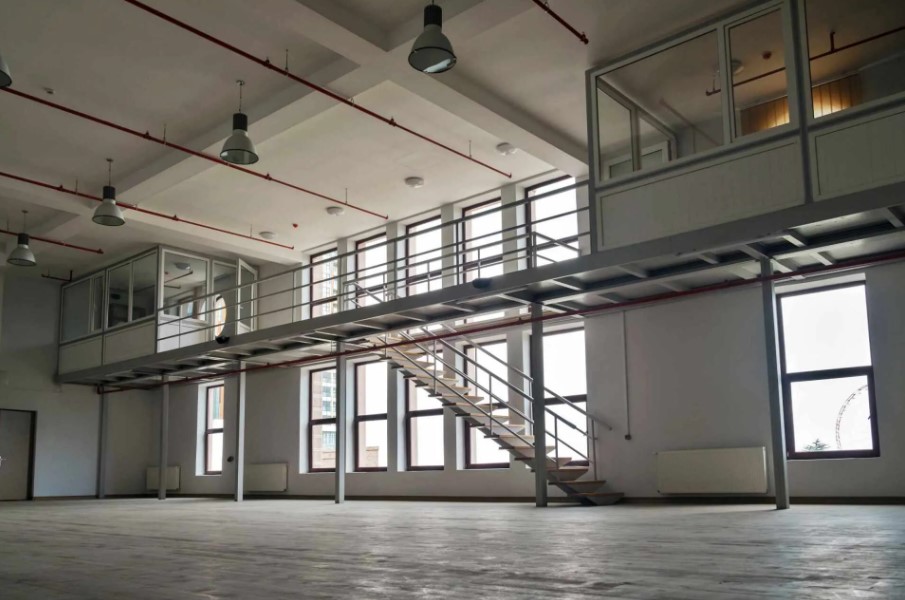 Four Reasons to Consider a Mezzanine Floor Plan -Upper level walk way and mezzanine.