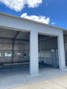 Professional Choice Sheds photo showing shed door opening with roller door unseen.