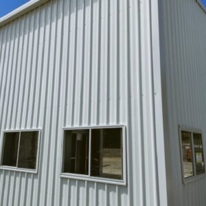 Exploring Class 1A Sheds in Australia, showing a large shed with side windows.