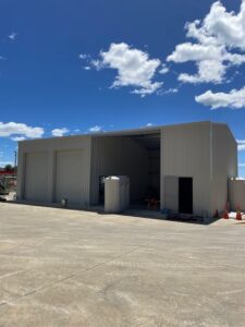 Sheds and Carports: What to Look for When Choosing Your Next Build, photo showing double door shed with open front